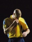 James Constable kissing the Oxford United badge